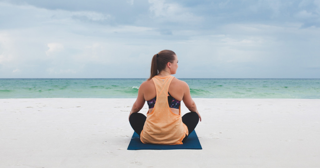 yoga saved me _ mediating on the beach